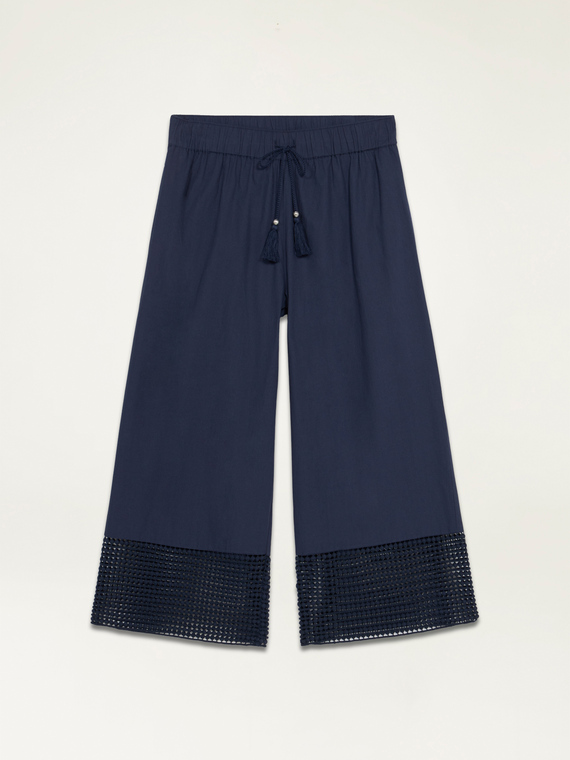 Cropped trousers with macramé inserts