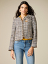 Short tweed jacket with brooch image number 0