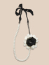 Collana di perle con fiocco bicolor image number 1