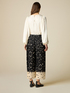 Patterned cropped pleated trousers image number 1