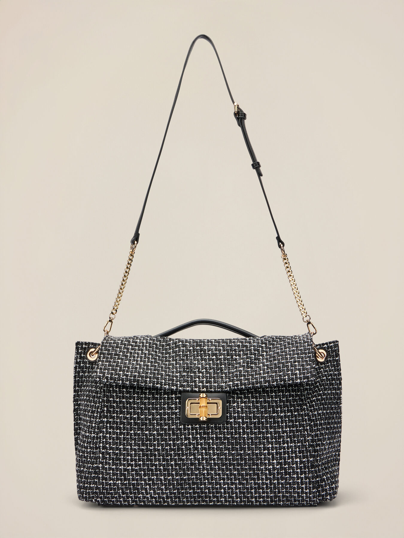 Bolso de tweed con cierre met&aacute;lico image number 1
