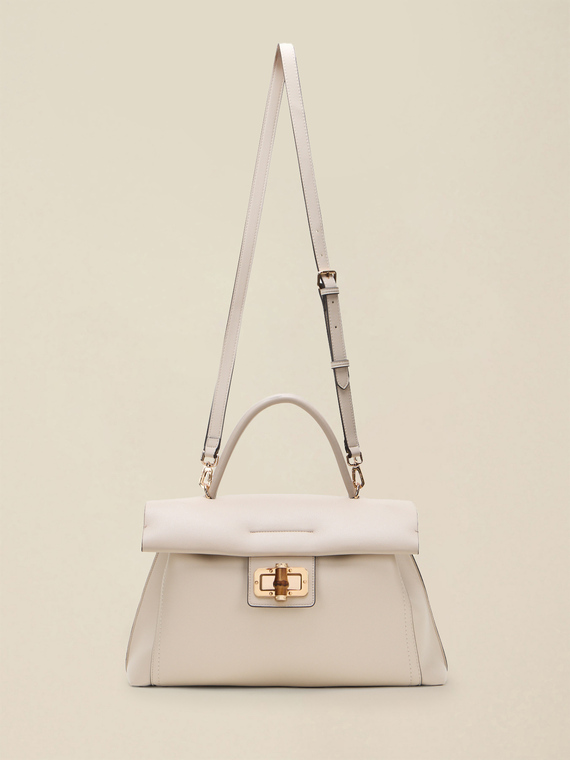 Crossbody bag with twist lock