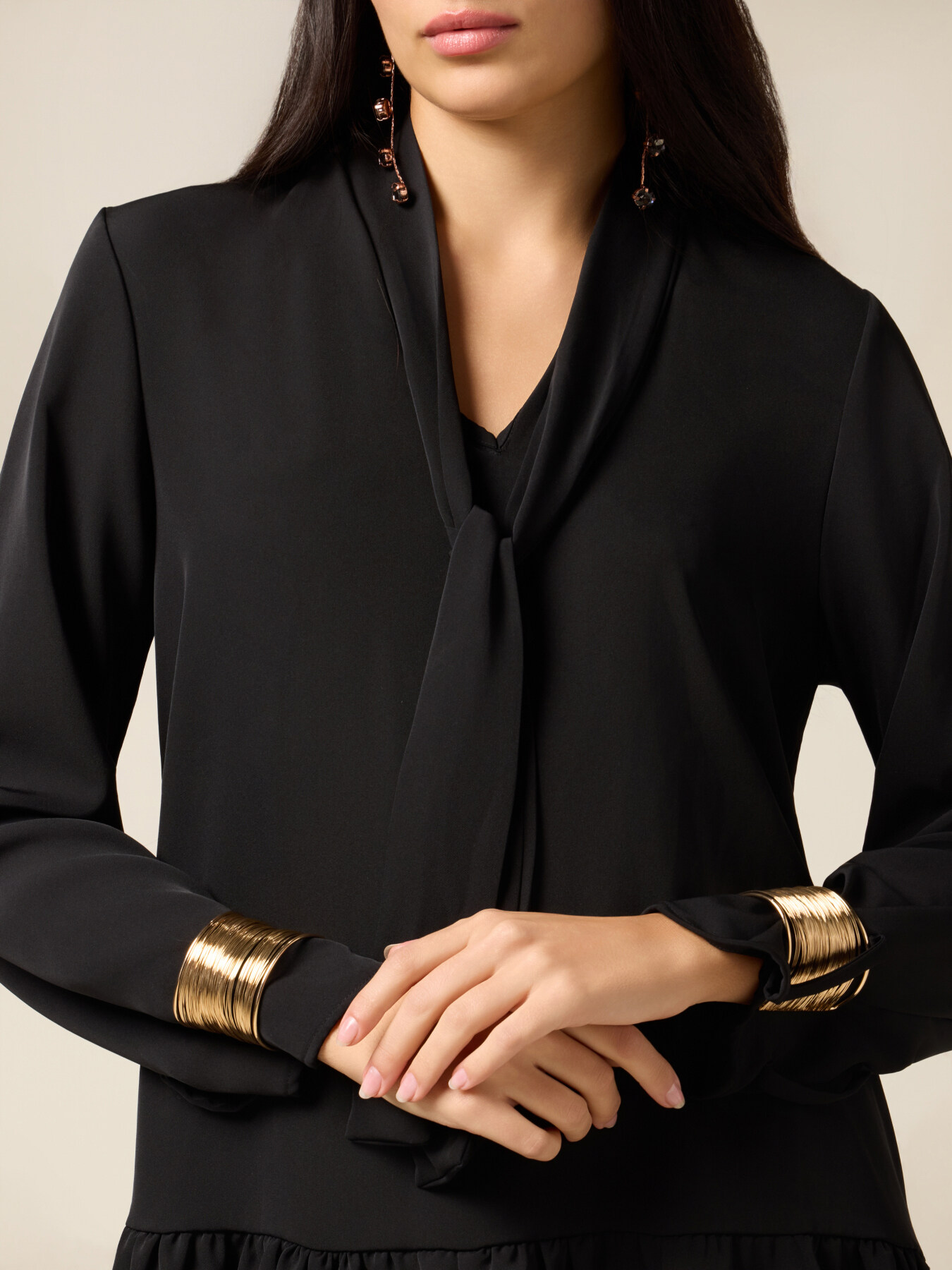 Flared dress with golden bracelets image number 2