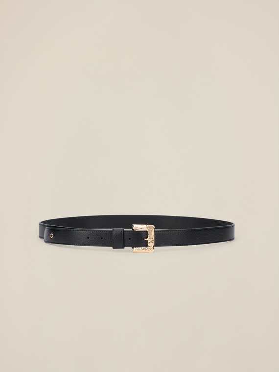 Belt with golden buckle