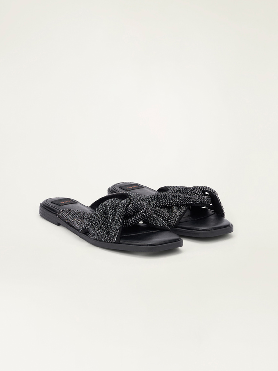 Flat slippers with knot