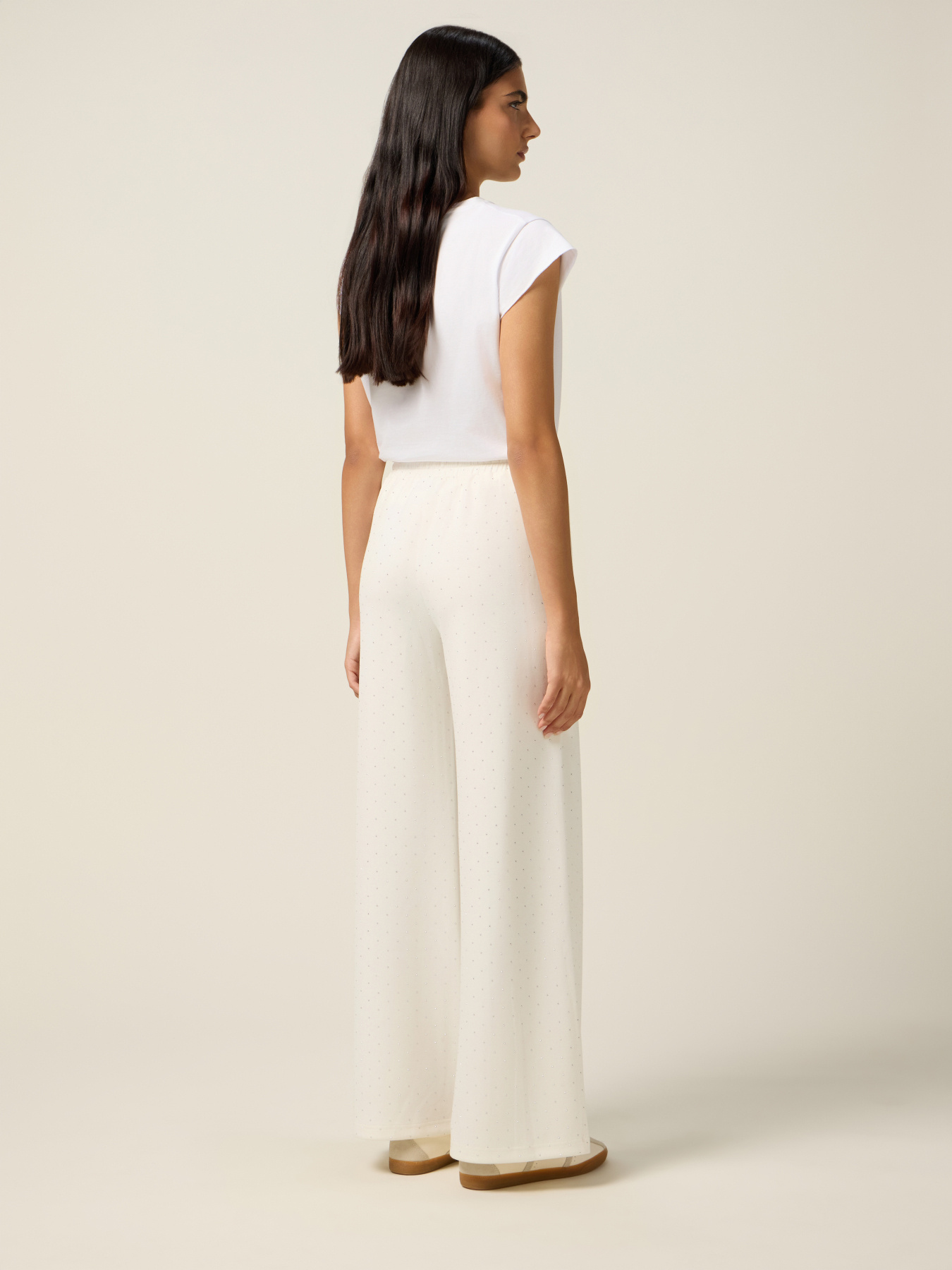 Pantaloni palazzo con micro borchie image number 1