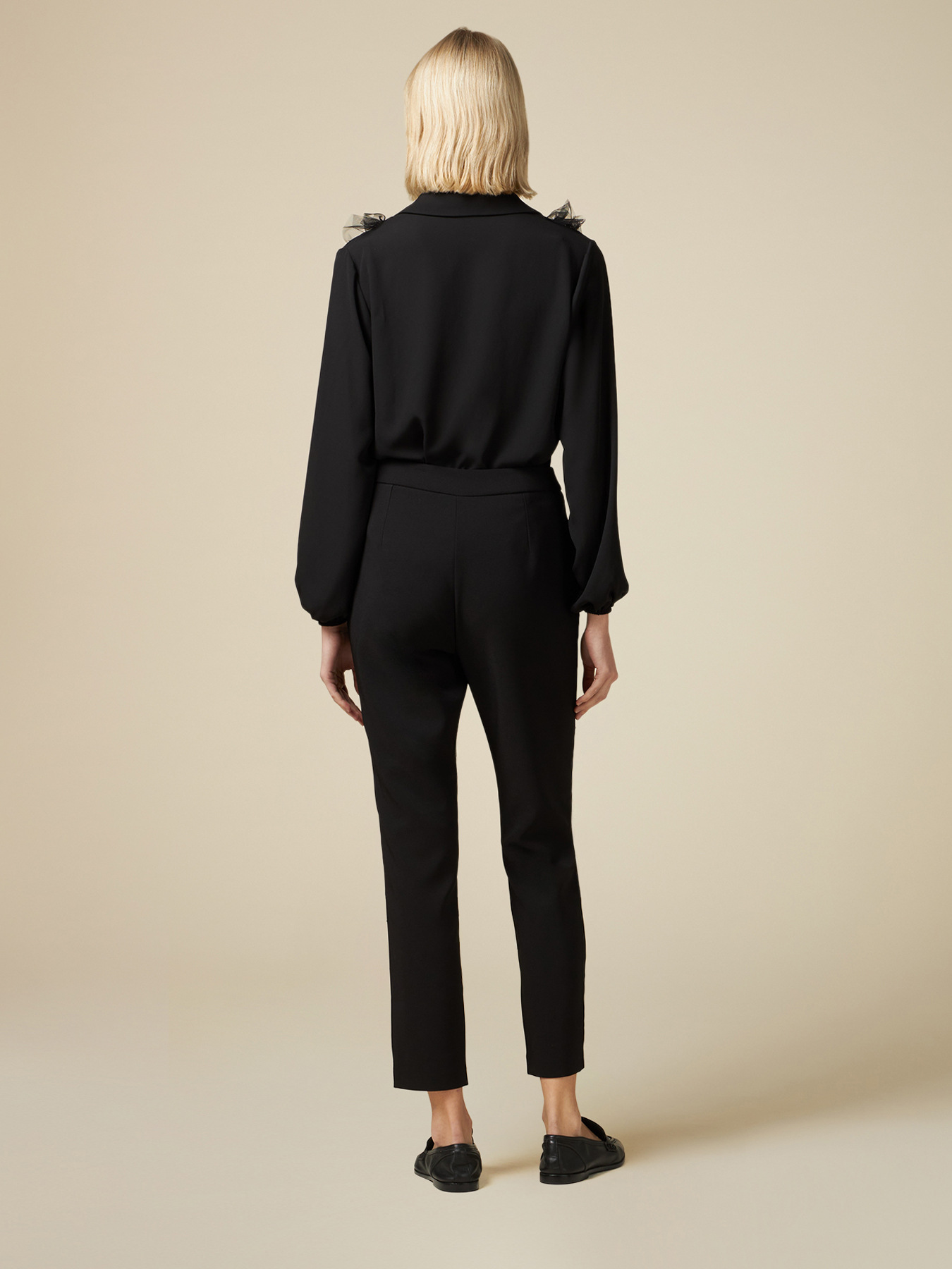 Pantaloni skinny con pioggia di strass image number 1