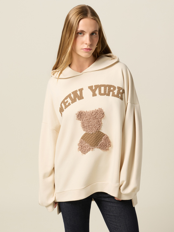 Closed hoodie with writing