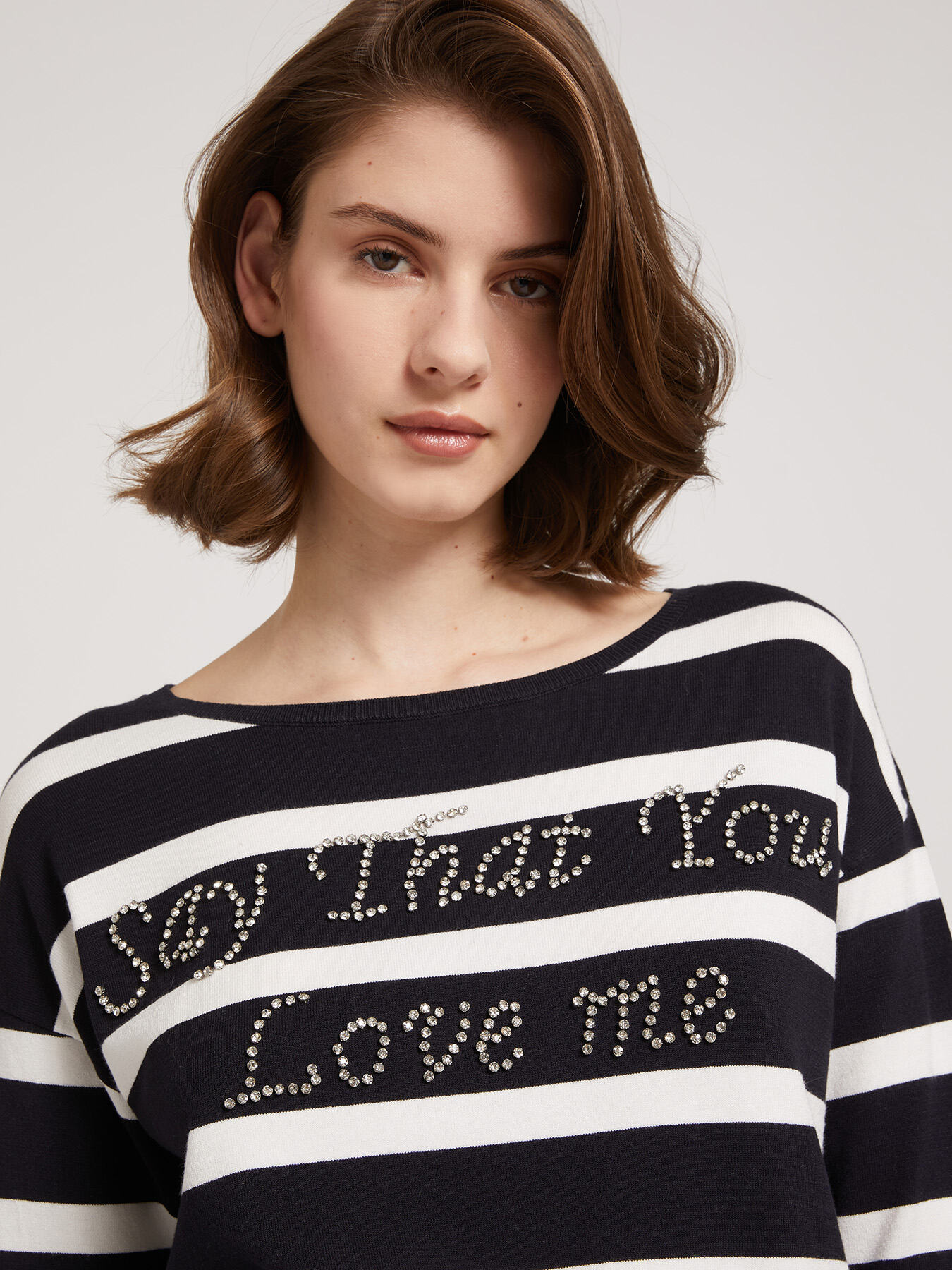 Sweater with lettering application image number 2