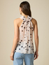 Polka dot top with flower image number 1