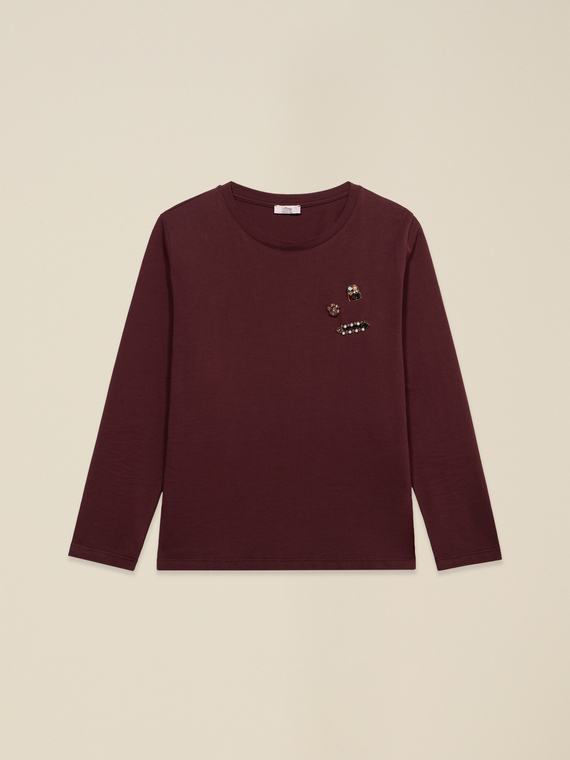T-shirt con spille