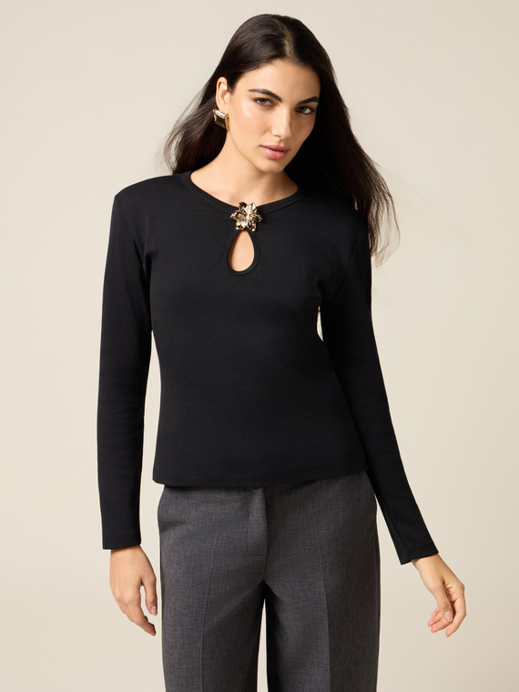 T-shirt with decorative appliqu&eacute;s