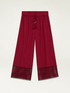 Cropped trousers with macramé inserts image number 4