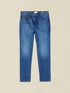 Washed skinny jeans with studs on the leg hem image number 4