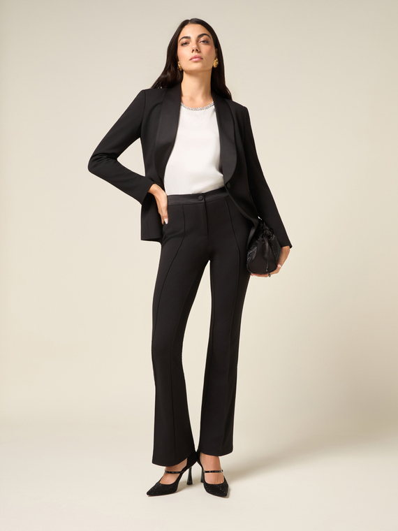 Pantalones acampanados en tejido crep&eacute;