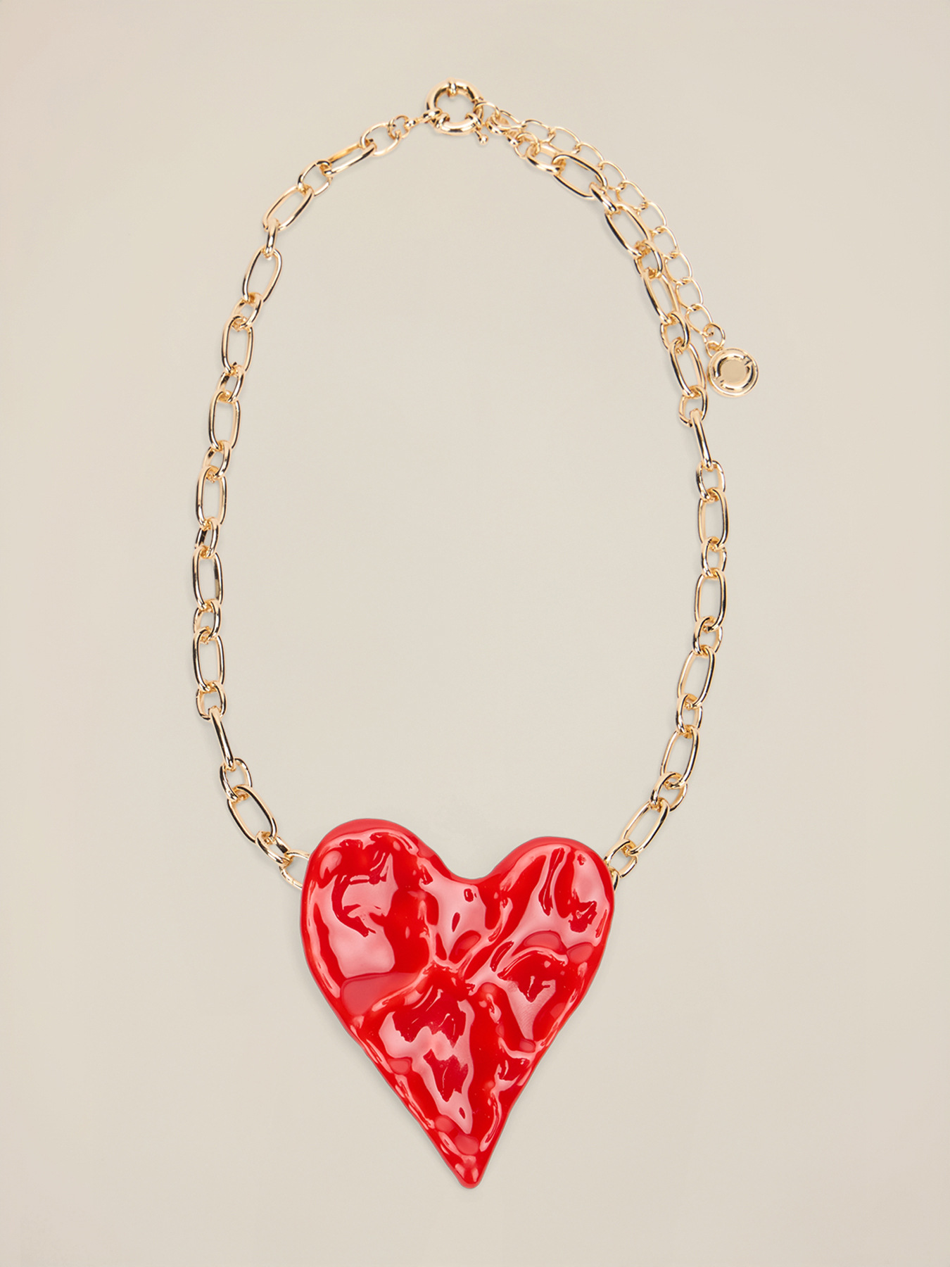 Metal necklace with oversized heart-shaped pendant image number 1