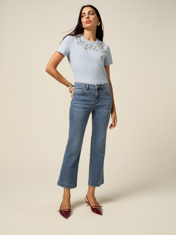 Stone-washed flare jeans