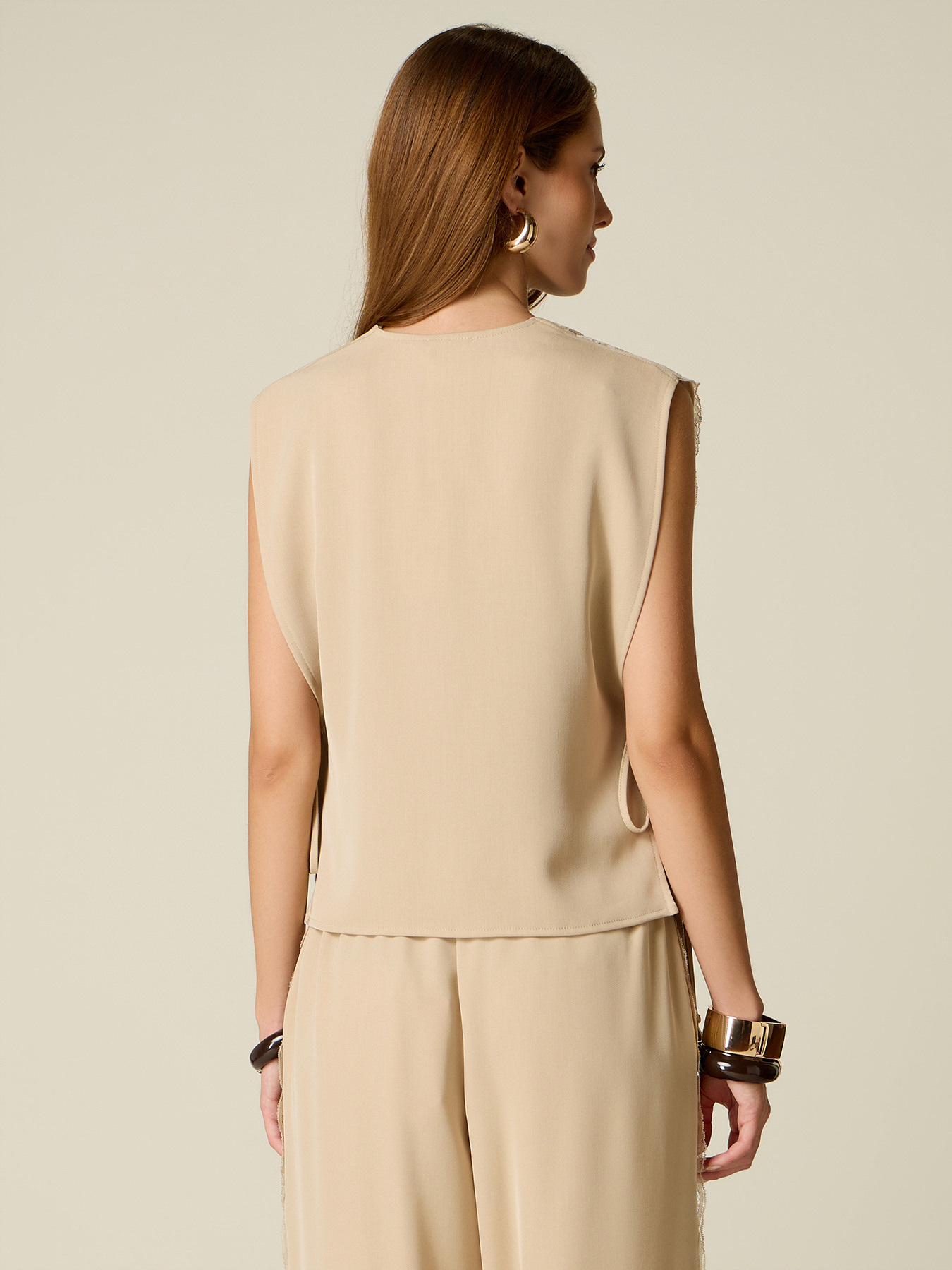 Asymmetric lace vest image number 1
