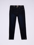 Rinse blue skinny jeans with buttons at the bottom of the leg image number 4