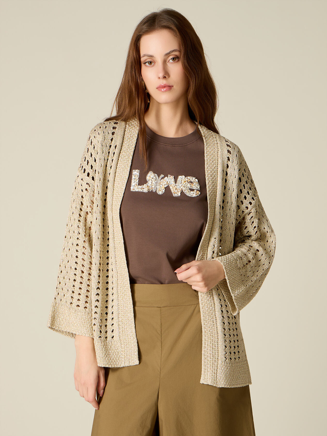 Kurze Strickjacke aus Lurex mit Lochmuster image number 0