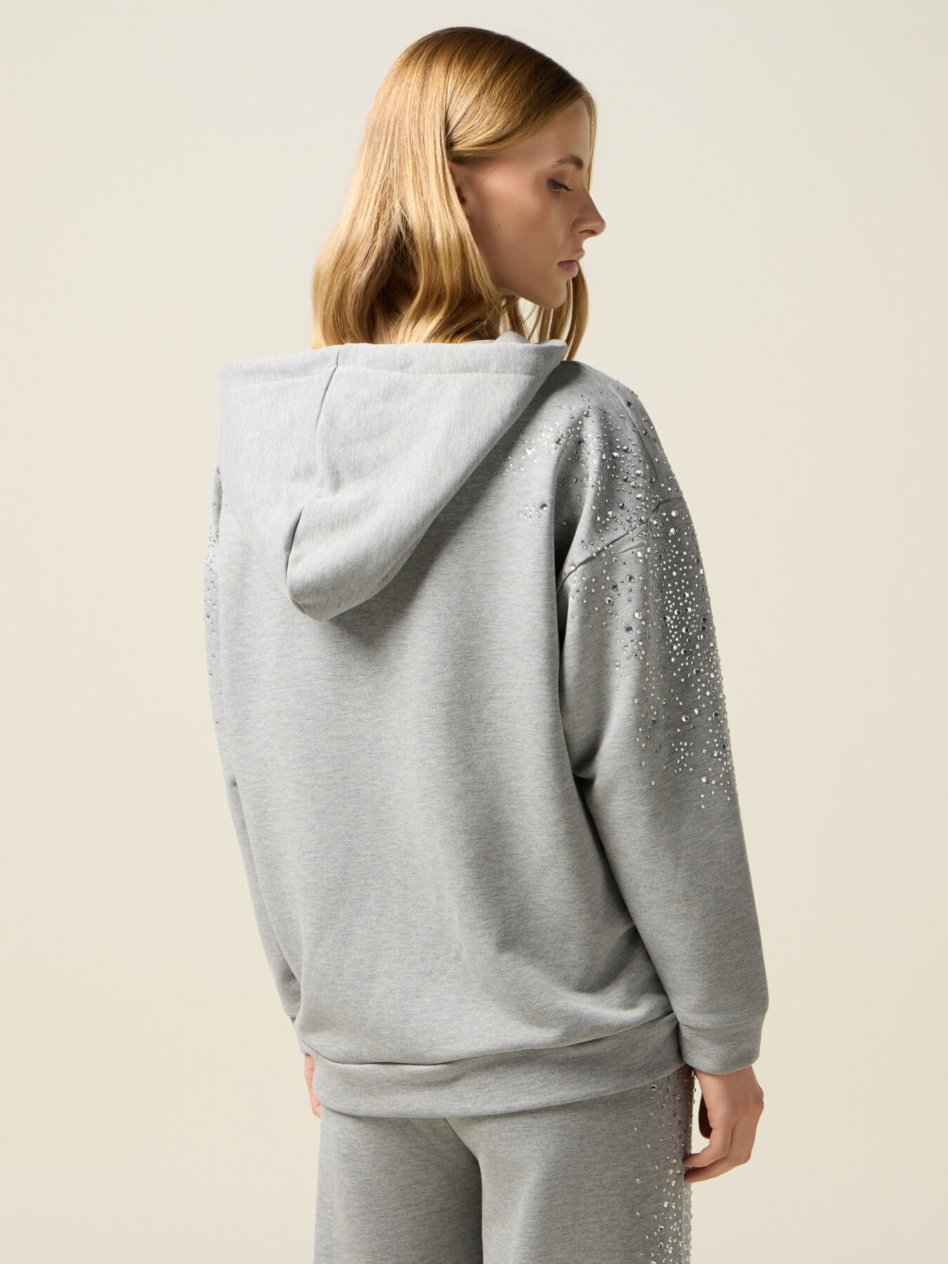 Zip-up sweatshirt with crystals on the sleeves image number 1