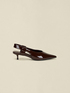 Patent leather slingback pumps image number 0