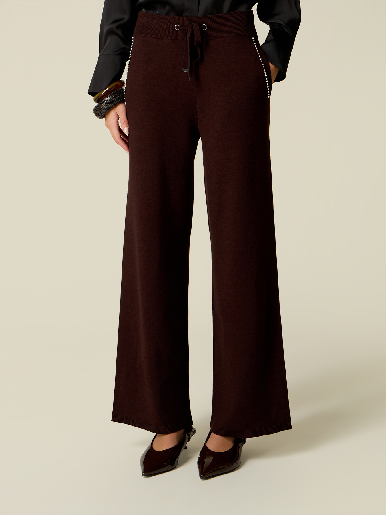 Knitted palazzo pants with stone details image number 3