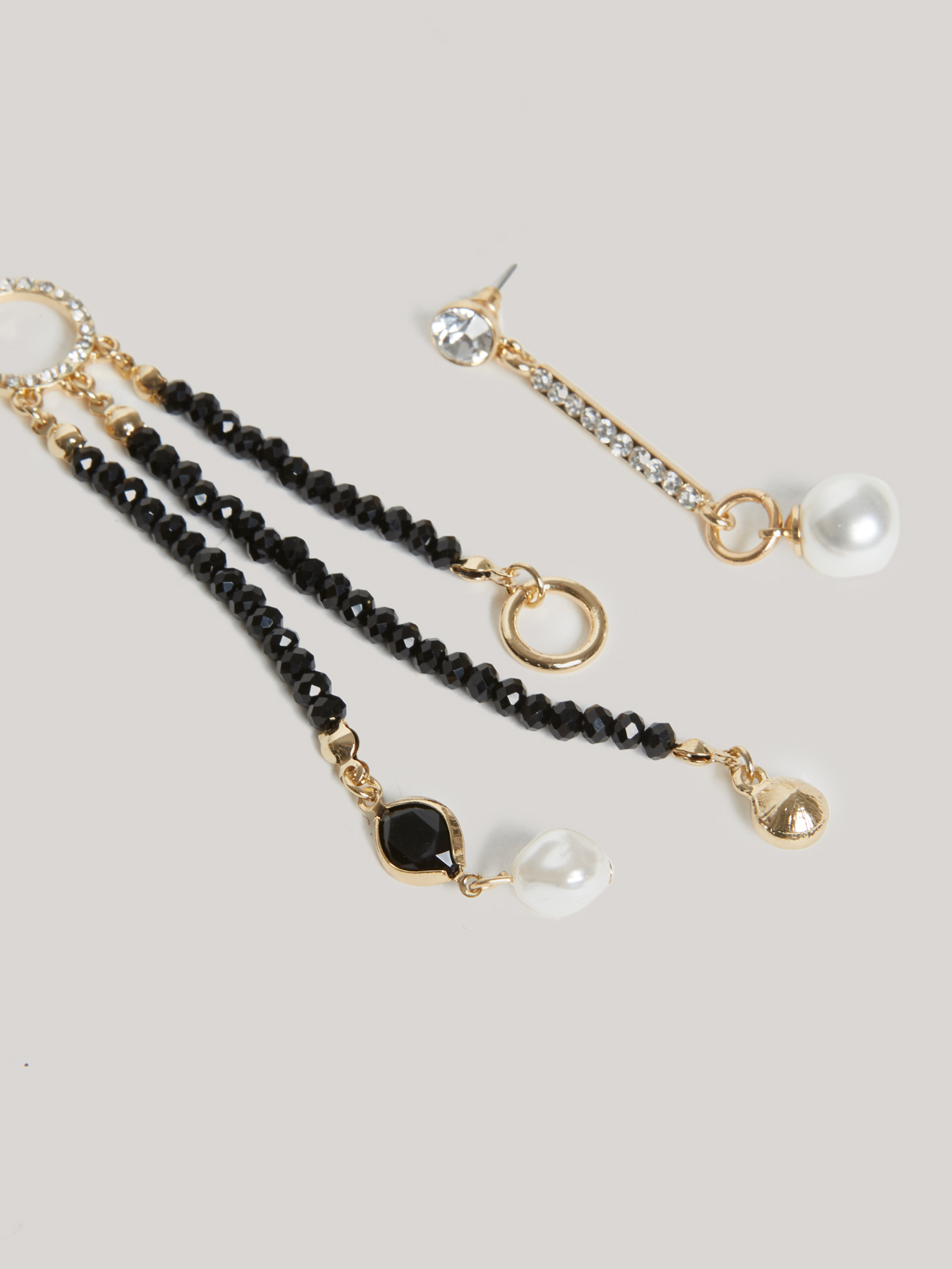 Orecchini asimmetrici con pietre image number 1