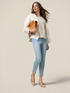 Skinny jeans with stone bleached effect and button details image number 0