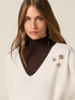 V-neck sweater with decorative pins image number 2