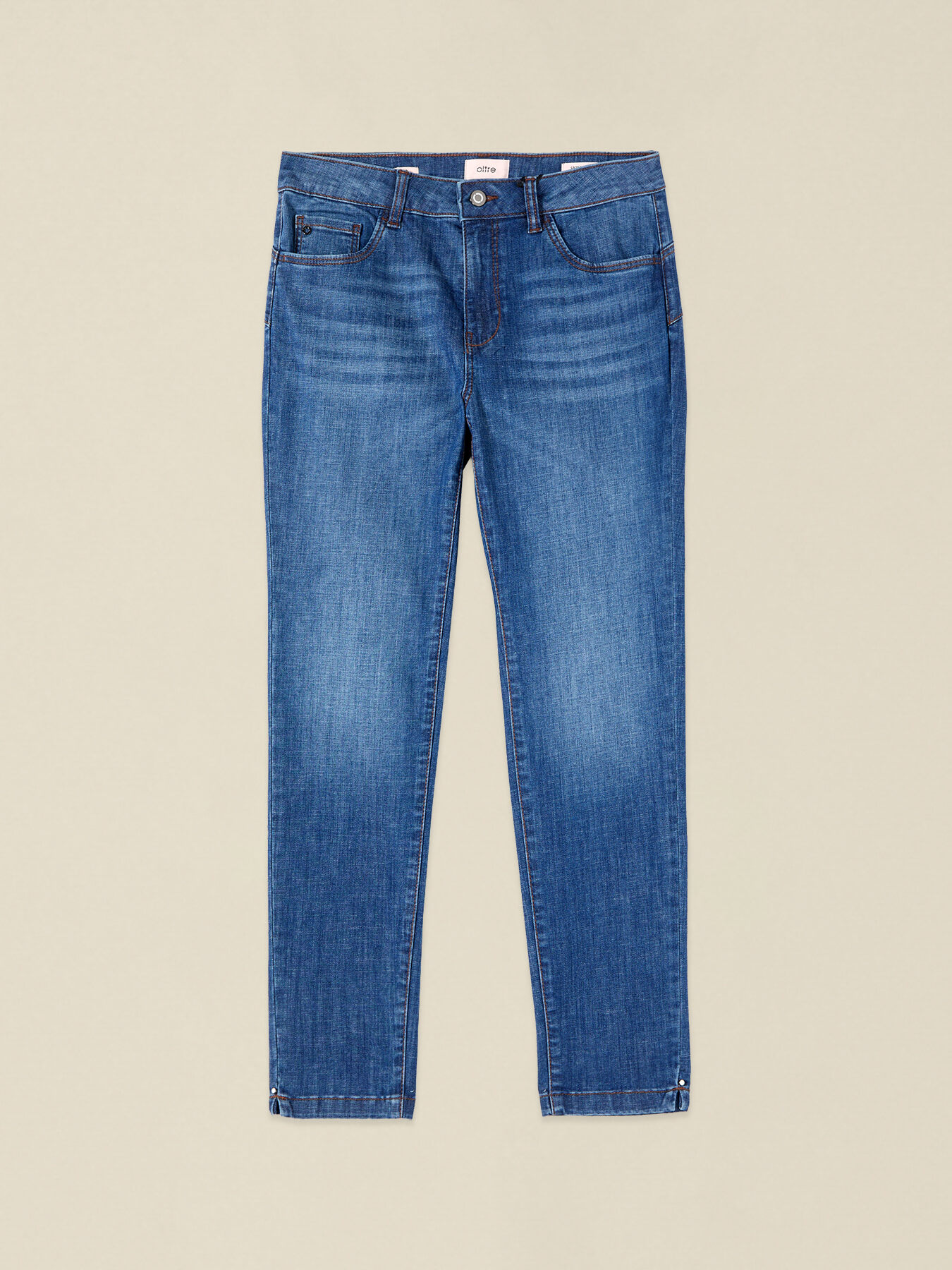 Washed skinny jeans with studs on the leg hem image number 4