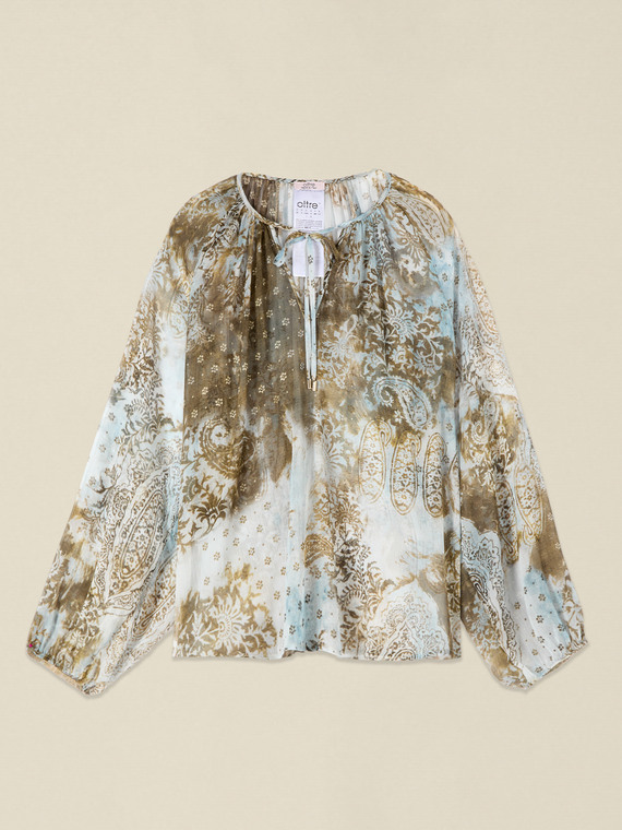 Blusa fantasia con maniche lunghe