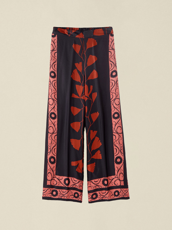 Pantalones palazzo de sat&eacute;n estampado