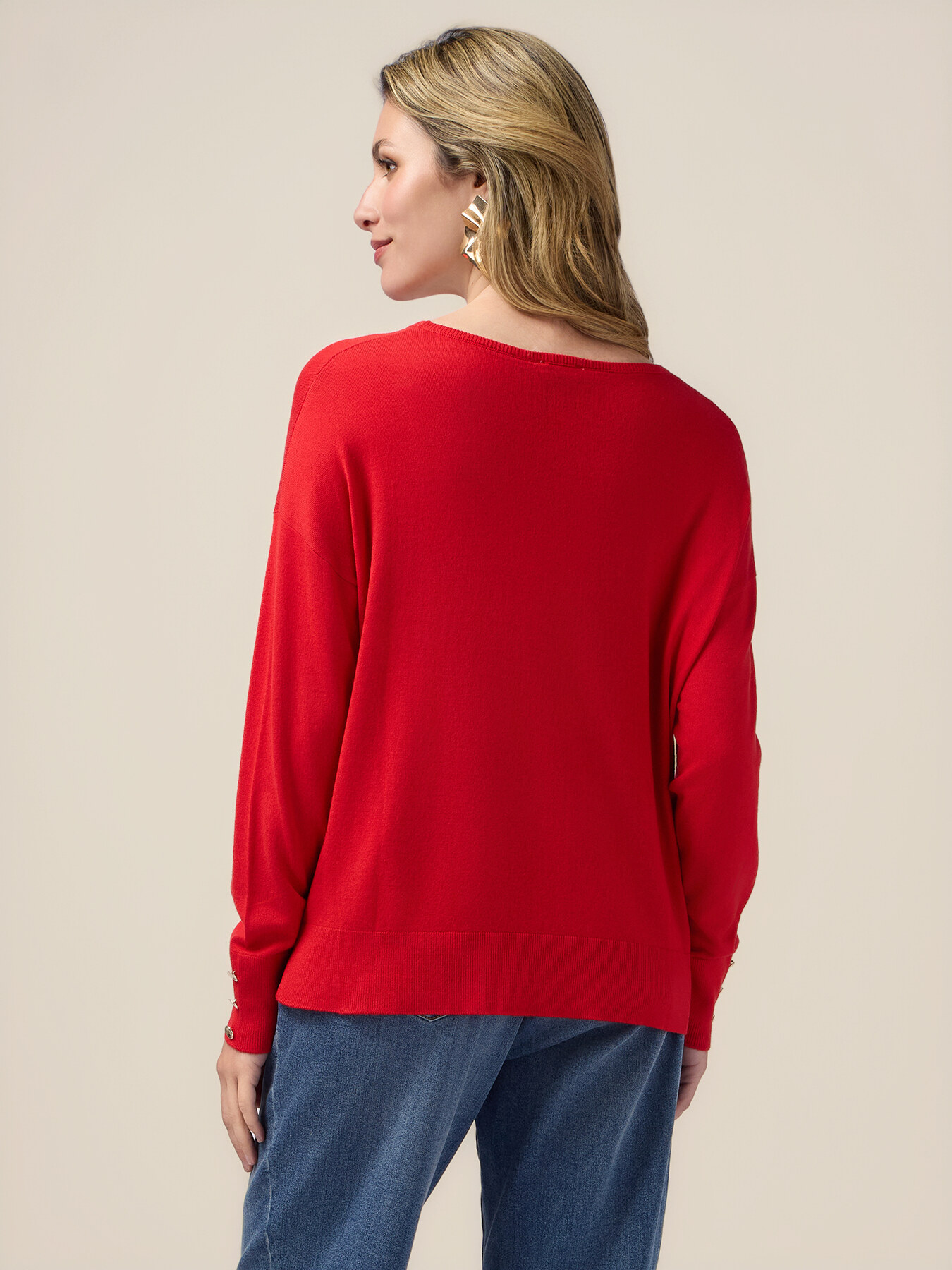 Boxy sweater with buttons at the bottom of the sleeves image number 1