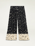 Patterned cropped pleated trousers image number 4