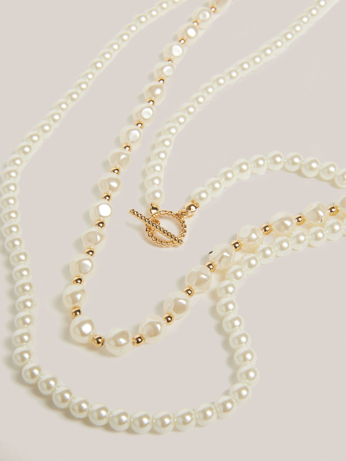 Pack di tre collane in perle image number 1