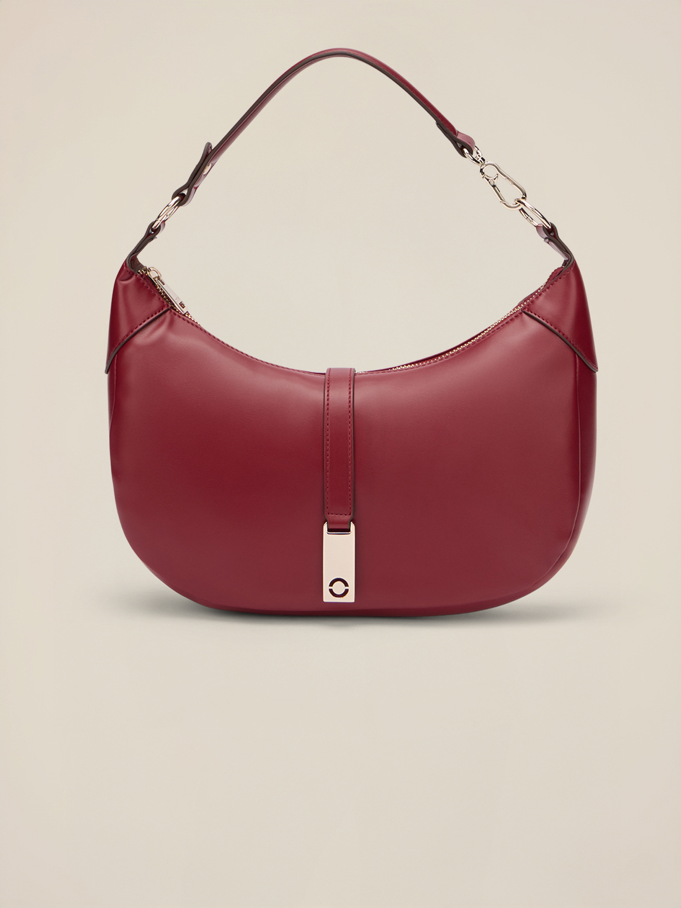 Shoulder bag with zip and metal charm image number 1