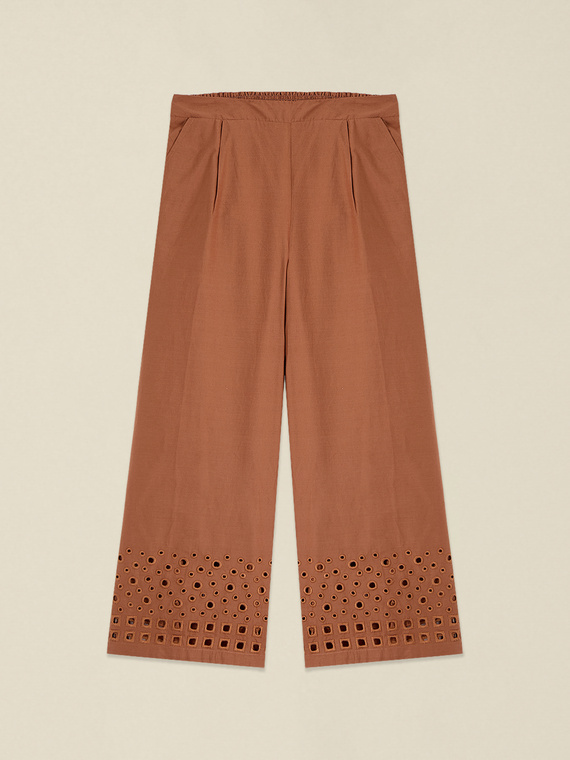Cropped trousers with embroidery on the hem