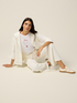 Pantaloni palazzo con micro borchie image number 0