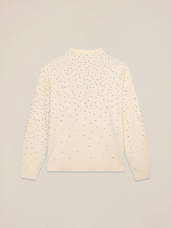 Pull &agrave; col roul&eacute; avec applications