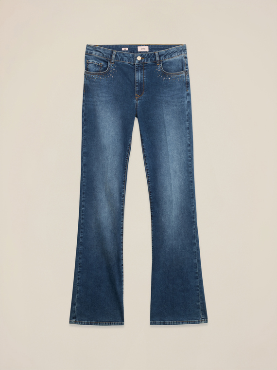 Jeans flare in denim con borchie
