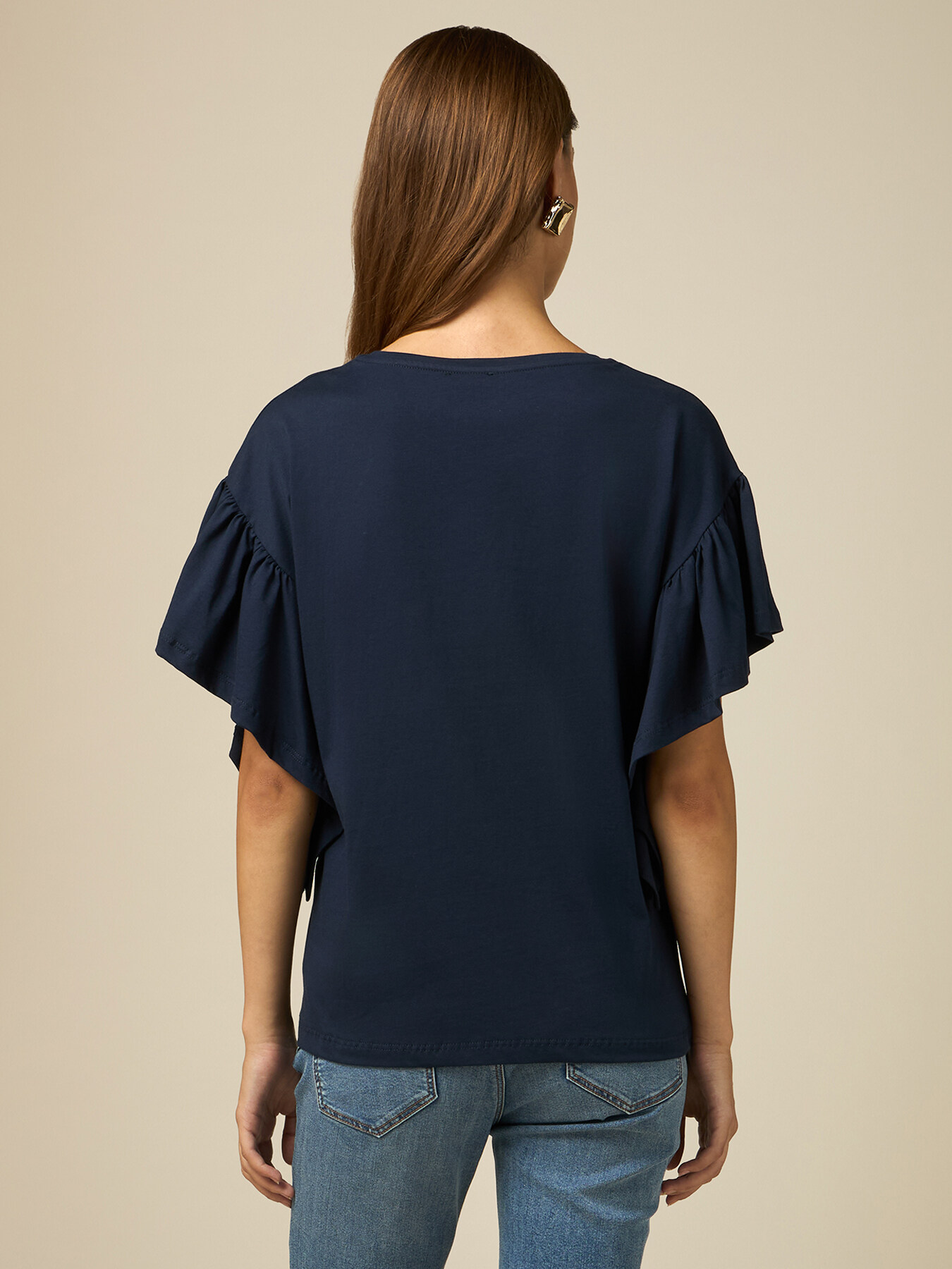 Camiseta con broche en forma de flor image number 1