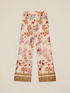Pantalones palazzo de sat&eacute;n estampado image number 4