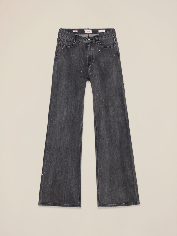 Jeans flare grigi con cristalli