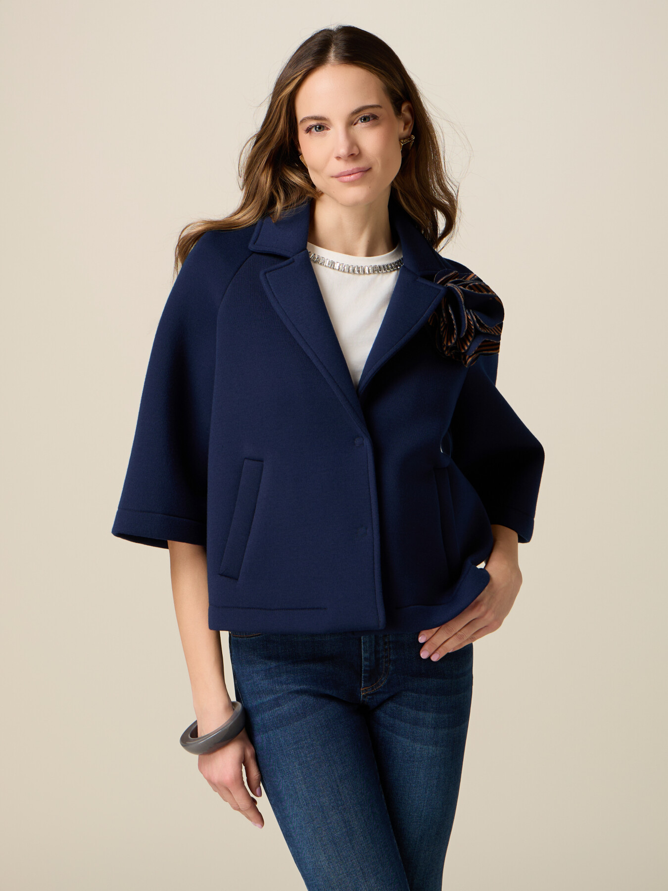 Cape in scuba with flower brooch image number 0