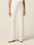 Pantaloni palazzo con micro borchie image number 3