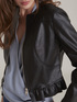 Short leather-effect jacket with ruffle image number 2