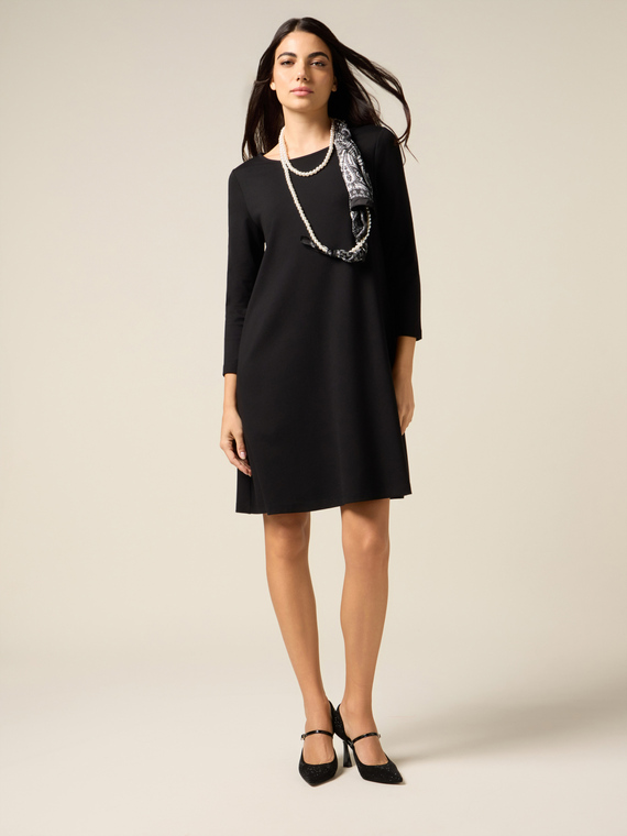 Flared dress with scarf detail