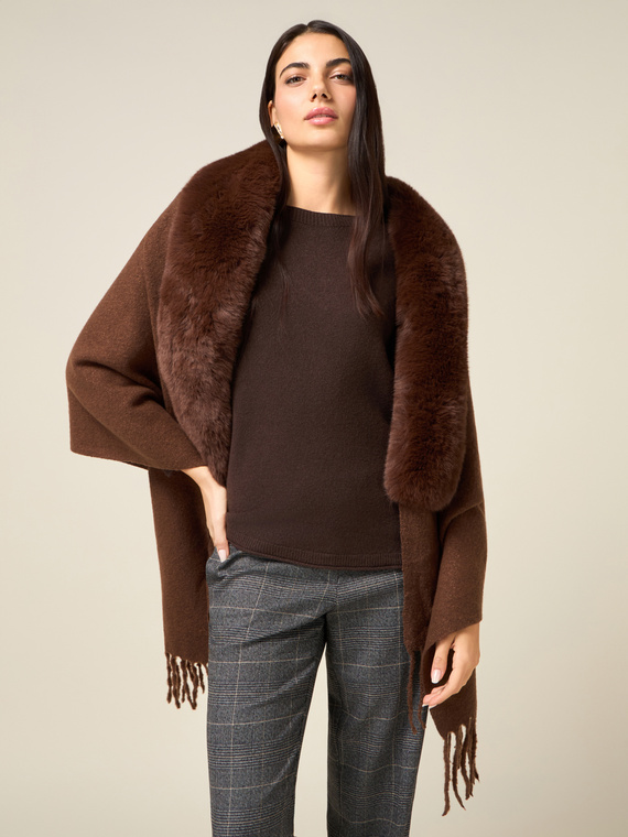 Poncho with fringes and plush trim