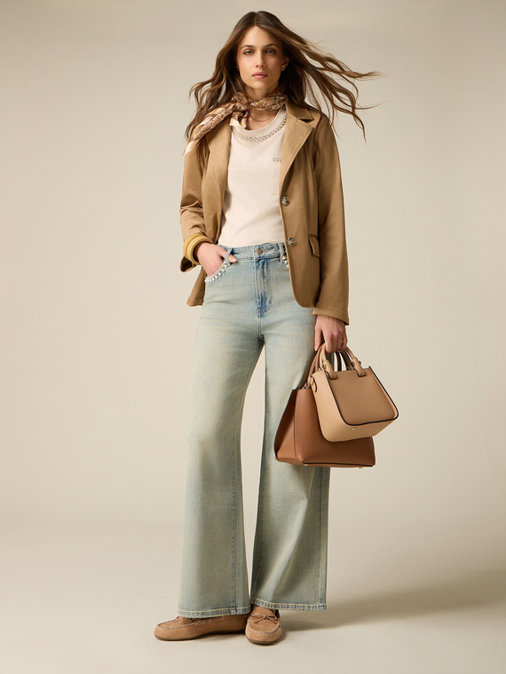 Jeans palazzo con aplicaciones